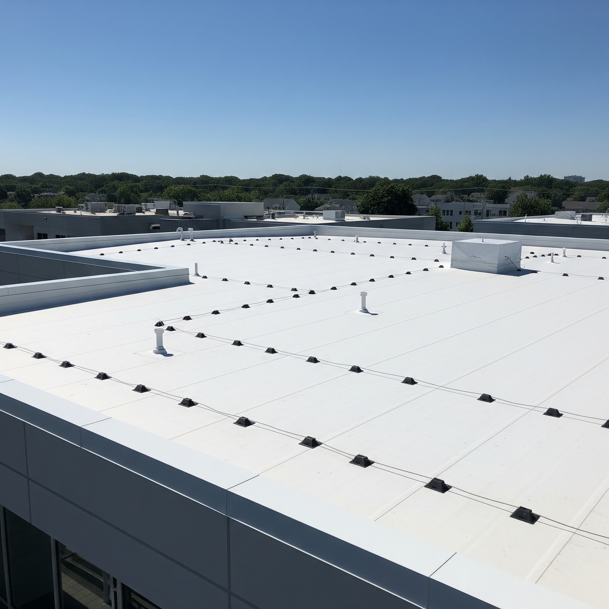 How to prevent roof ponding on flat commercial roofs